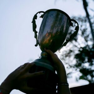 A Person Holding a Trophy